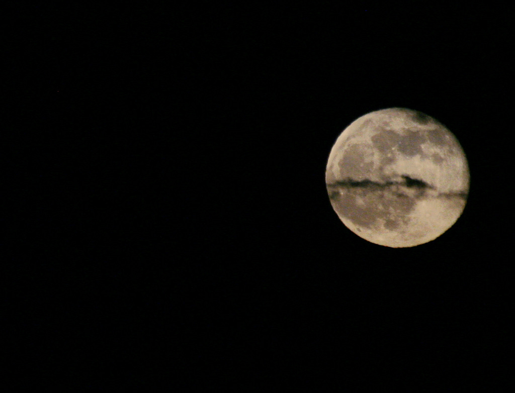 Moon with clouds in front