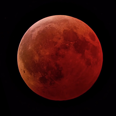 Moon at full size and appears red