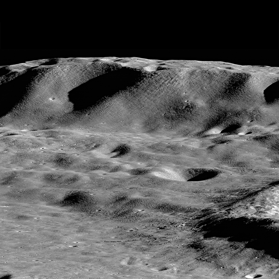 mountain and craters on lunar surface