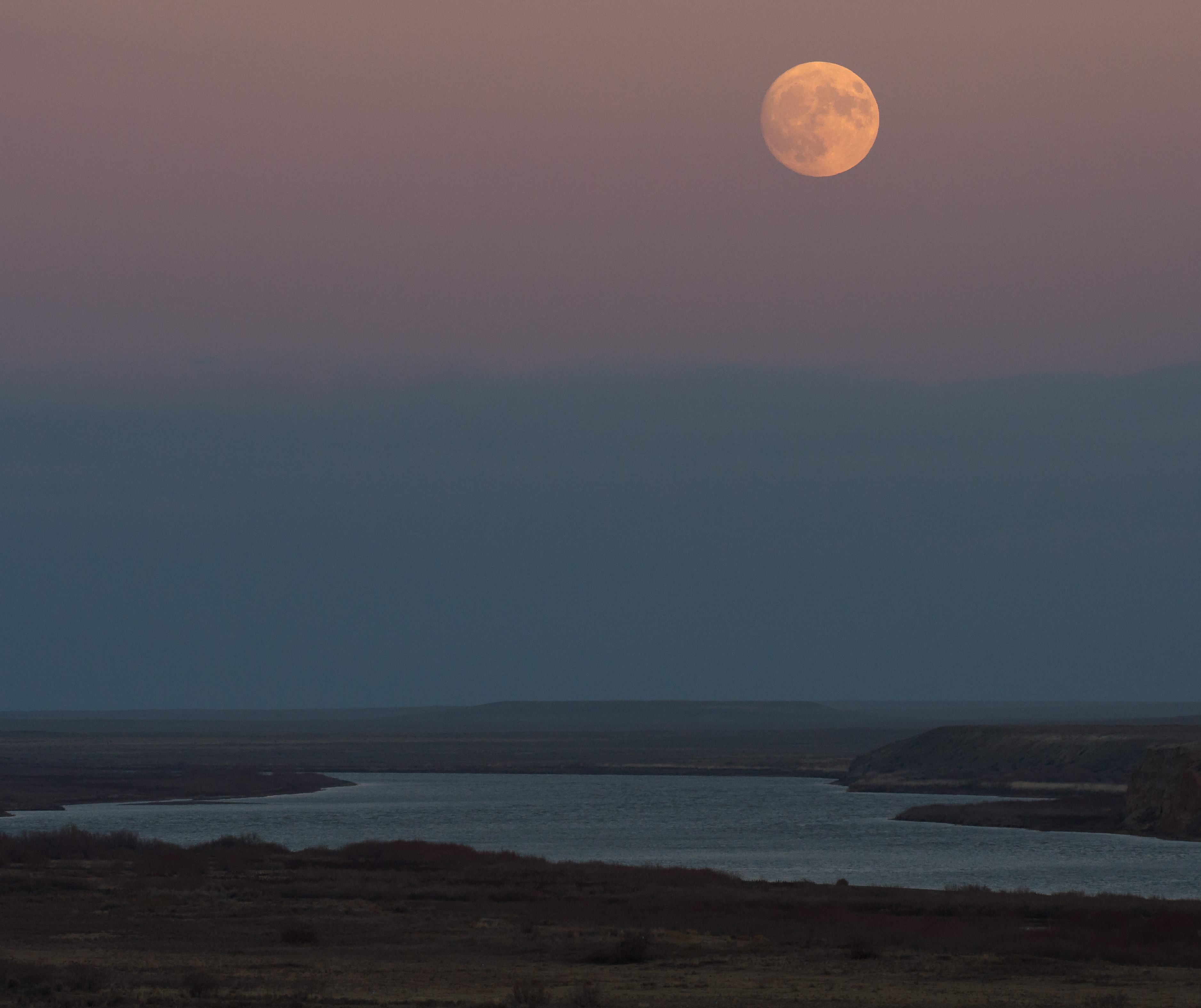 Moonrise over the Syr Darya river.