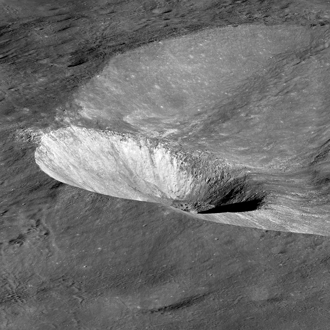 crater on a slope of a larger crater