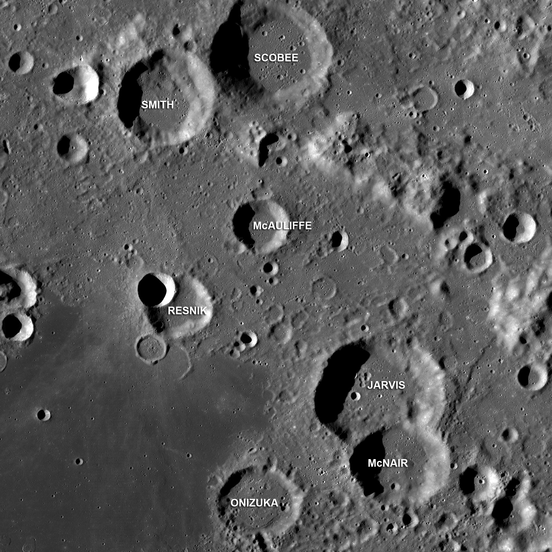 Image of the Moon with seven craters named after the crew of the lost Challenger Space Shuttle - Gregory Jarvis, Christa McAuliffe, Ronald McNair, Ellison Onizuka, Judith Resnick, Dick Scobee, and Michael Smith. 