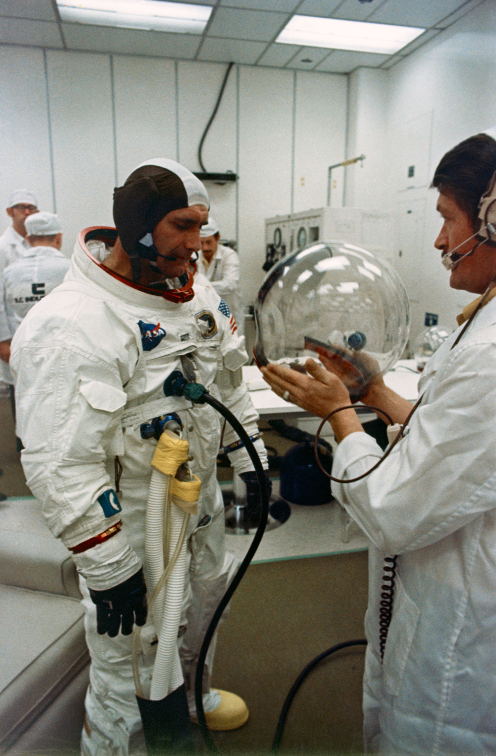 Astronaut putting on his helmet