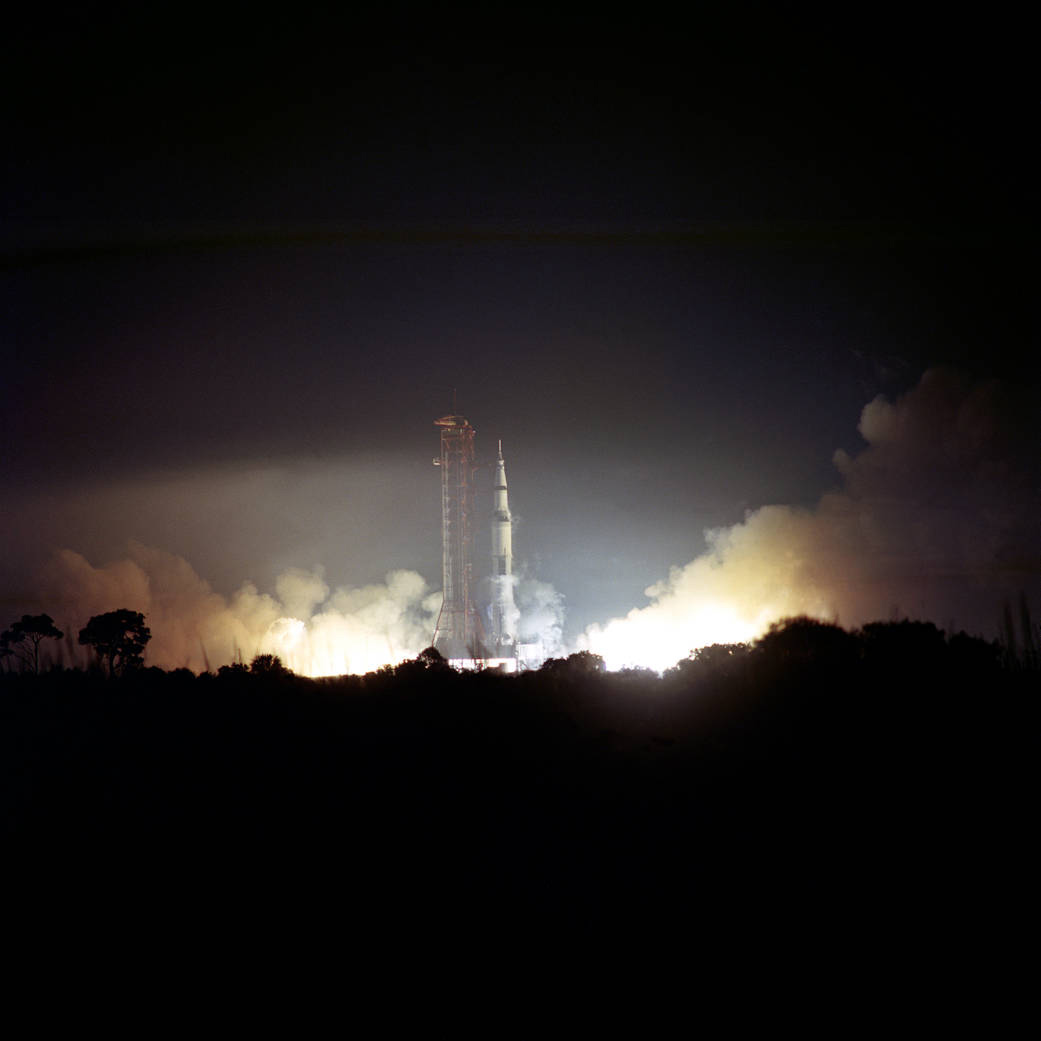 Apollo 17 launch illuminates nighttime scene