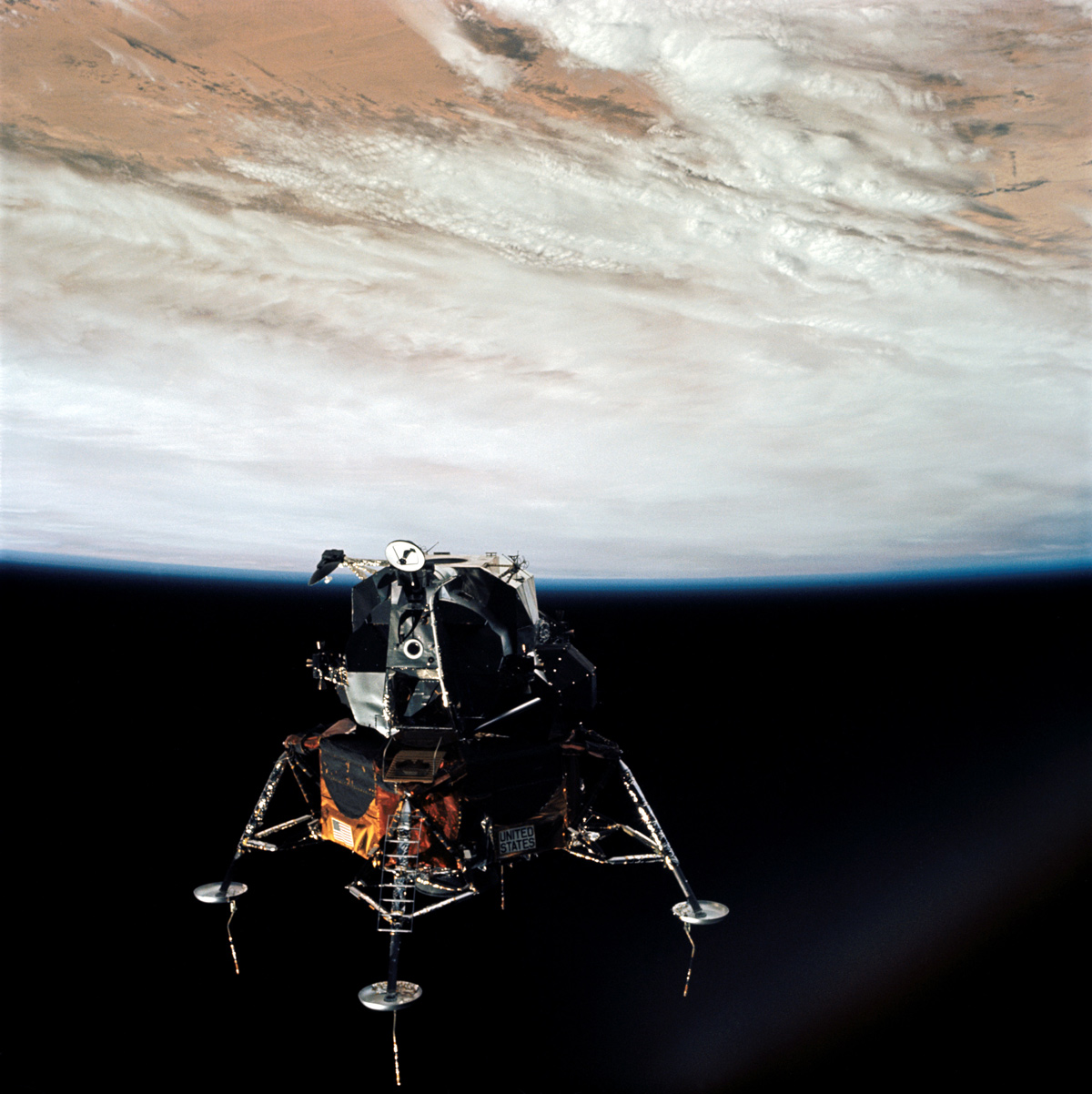 Apollo 9 Lunar Module in space with Earth in the background