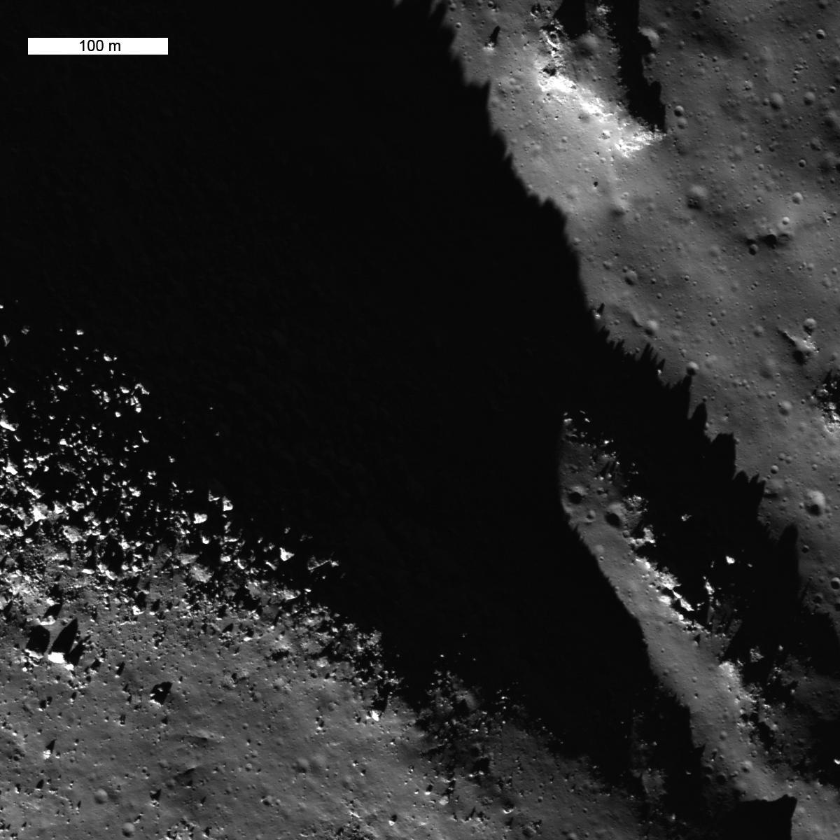 shadowy depths and brightly-illuminated rocks on the Moon