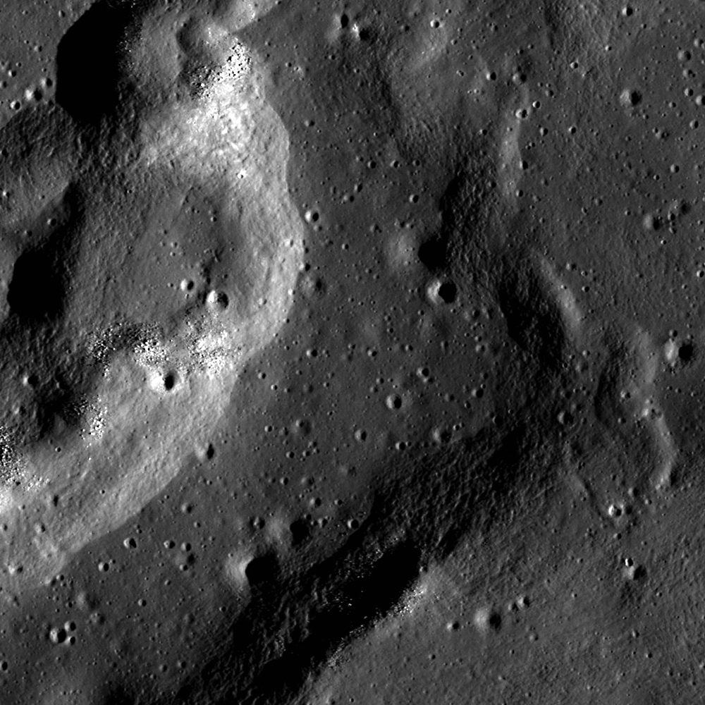 Apollo 17 was the final mission of NASA's Apollo program, the most recent time humans have set foot on the Moon. This image shows an astronaut in the Lunar Excursion Module (LEM) within the Taurus-Littrow Valley. A key scientific goal of the mission was to collect rock samples from the Serenitatis basin rim to find out exactly how old it is.