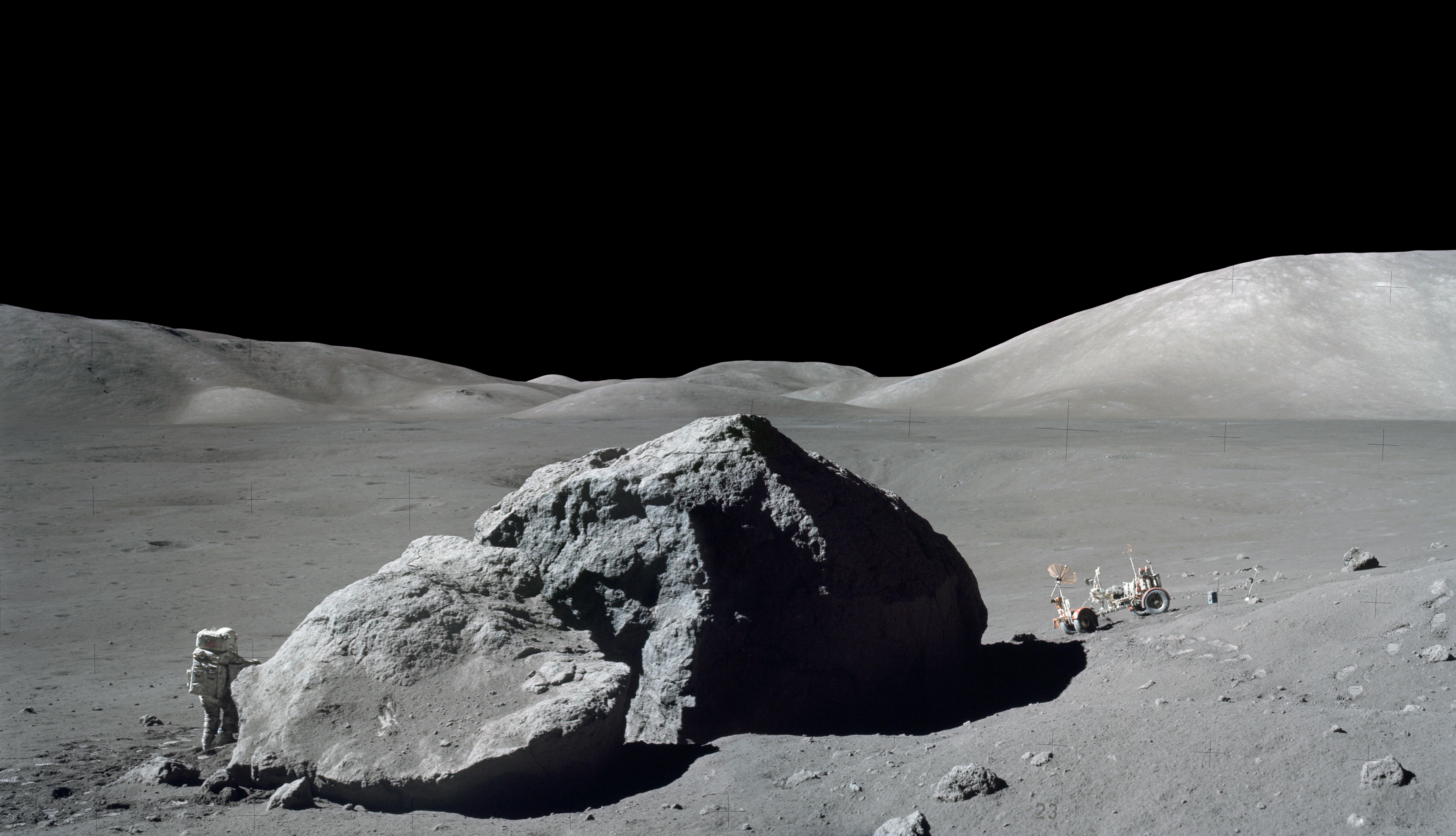 Astronaut and rover on the Moon