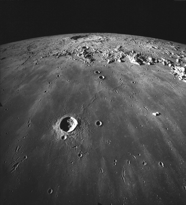 The crater Copernicus, 93 kilometers in diameter, is seen in the distance.