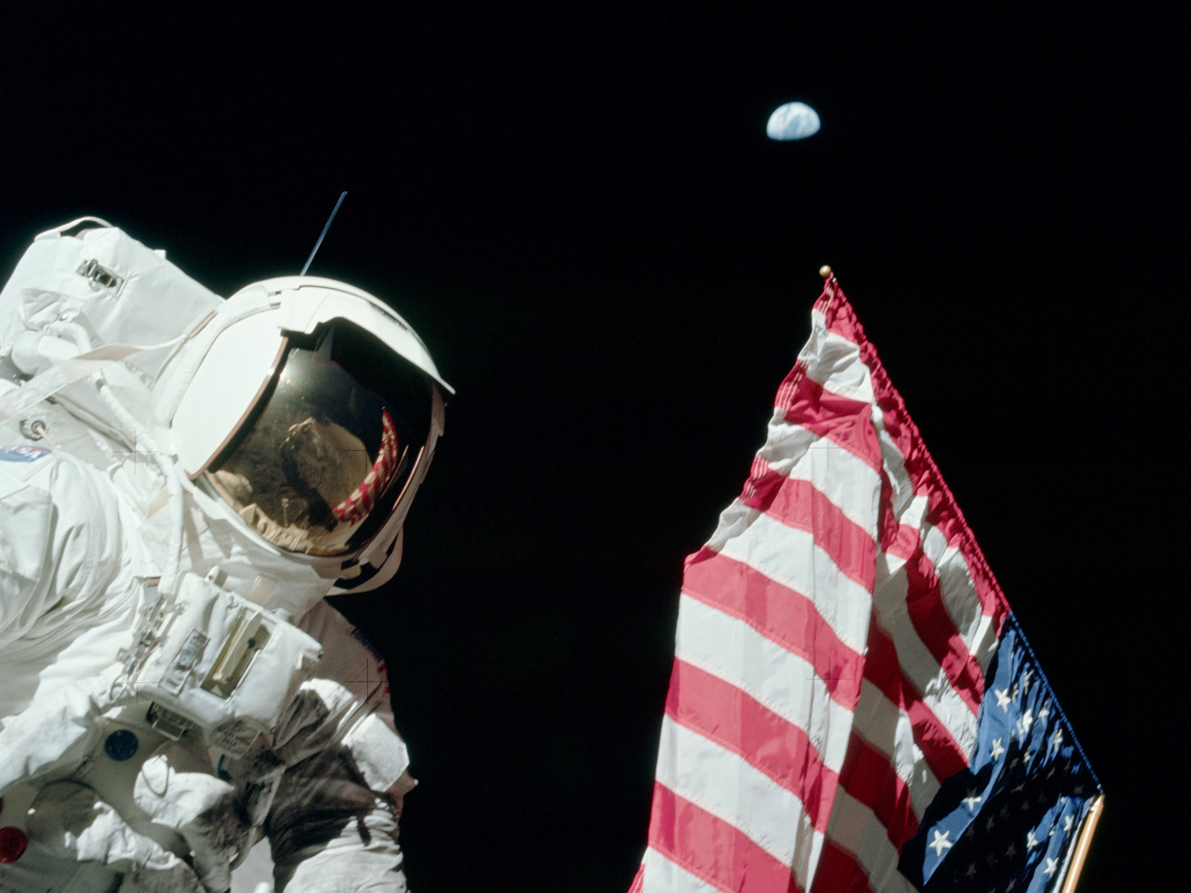 a-flag-points-home-moon-nasa-science