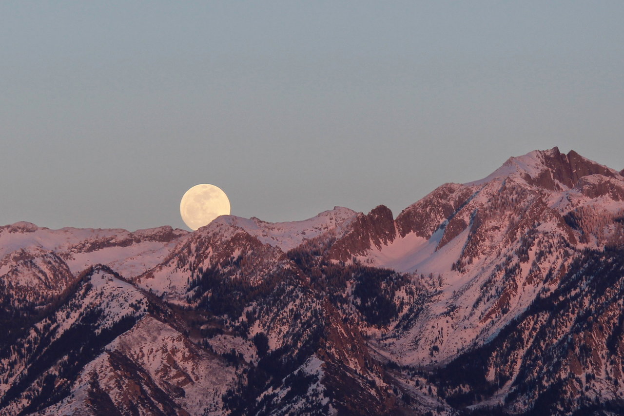 Full Moon over mountains.